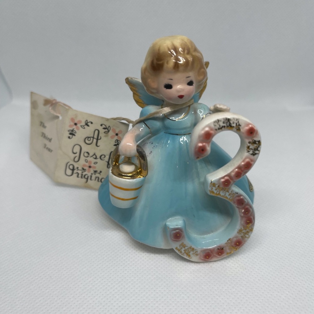 JOSEF ORIGINAL year 3 girl in blue dress figurine, small chip on wing see photo,